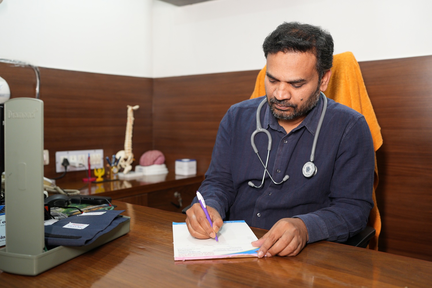 Dr. Dasaroju Ramesh
MD, DM (Neurology) Neurologist performing advanced brain scan and neurological assessment on a patient at Vishwas Super Speciality Hospital